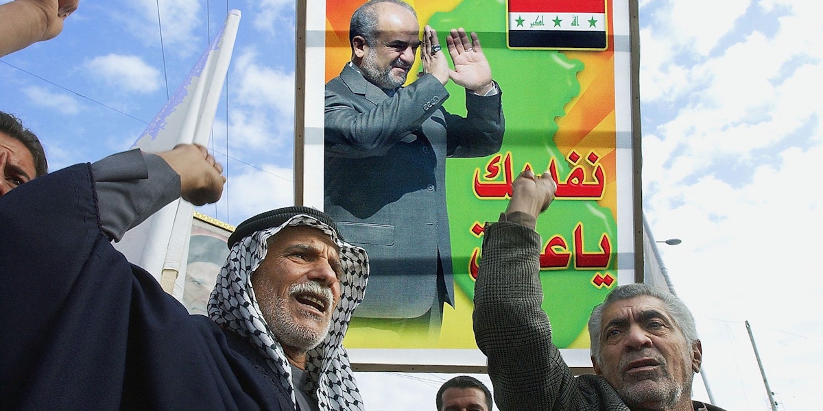 BAGHDAD, IRAQ - DECEMBER 25: Iraqi Shiites carry a picture of Iraq's Prime Minister Ibrahim al-Jaafari during a demonstration on December 25, 2005 in Baghdad, Iraq. Iraqi shiites shout slogans in favour of the results of the elections
 during a demonstration  in al-Sadr city eastren of Baghdad.
 (Photo by Wathiq Khuzaie /Getty Images)