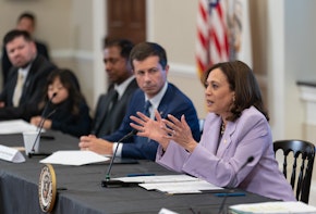 Vice President Kamala Harris and Pete Buttigieg sitting together on a panel.