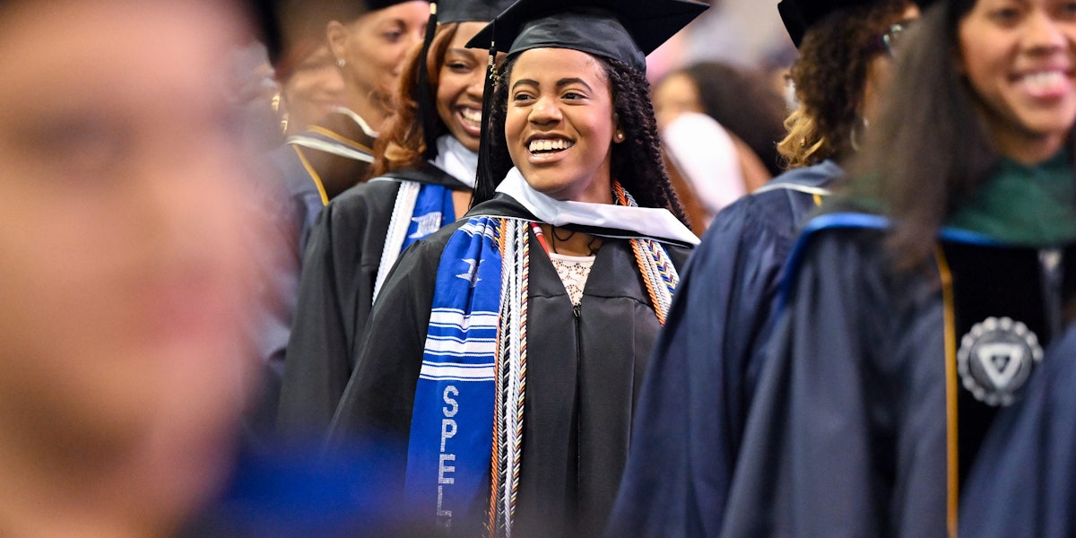 COLLEGE PARK, GEORGIA - MAY 21: A Spelman graduate arrives at 2023 136th Spelman College Commencement Ceremony at Georgia International Convention Center on May 21, 2023 in College Park, Georgia. (Photo by Paras Griffin/Getty Images)