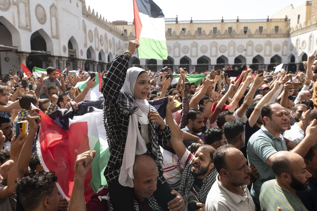 Demonstrators shout slogans during a protest in support of the Palestinian people at Al Azhar mosque, on October 20, 2023 in Cairo.