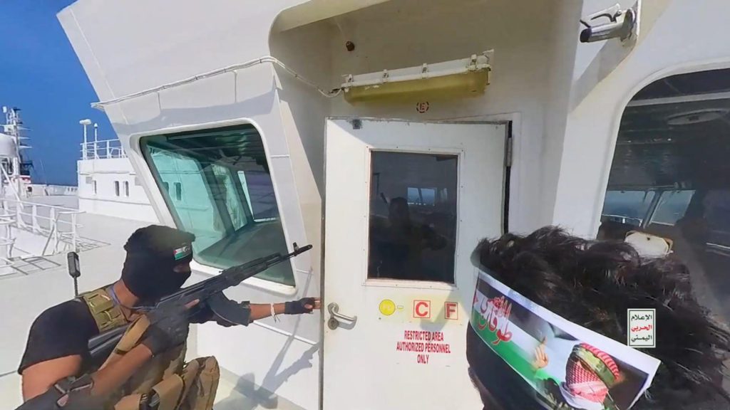 A screen grab from a video shows Yemen's Houthi fighters' takeover of the Galaxy Leader Cargo in the Red Sea on November 20, 2023.