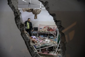 KHAN YUNIS, GAZA - DECEMBER 17: People inspect the damage caused by an artillery shell that hit the maternity hospital inside the Nasser Medical Complex, on December 17, 2023 in Khan Yunis, Gaza. One person was killed and others injured when a shell hit the hospitals children and maternity ward this evening. Fewer than one-third of Gaza's hospitals are functioning in any capacity, and Nasser hospital in Khan Yunis, the Gaza Strip's second-largest city, is inundated with daily with people wounded or killed in airstrikes, as Israel's campaign to defeat Hamas extends into its third month. (Photo by Ahmad Hasaballah/Getty Images)