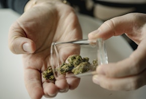 Close up of senior woman using cannabis at home