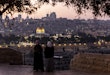 JERUSALEM, ISRAEL - DECEMBER 29: Palestinian women stand at Rekhav'am Observation Point at the Mount of Olives with Al-Aqsa Mosque in the backgroundon December 29, 2023 in Jerusalem. Israel's PM Netanyahu announced an intensification of the fighting in Gaza whilst facing  internal pressure to save hostages. Israel indicated 129 people remain unaccounted for after they were taken as hostages to Gaza during the October 7 attacks by Hamas. (Photo by Maja Hitij/Getty Images)