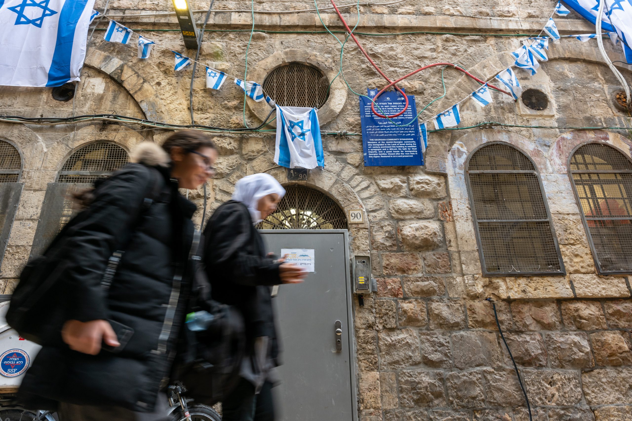 People walk through the Old City of Jerusalem on December 06, 2023. Source: Amir Levy/Getty Images