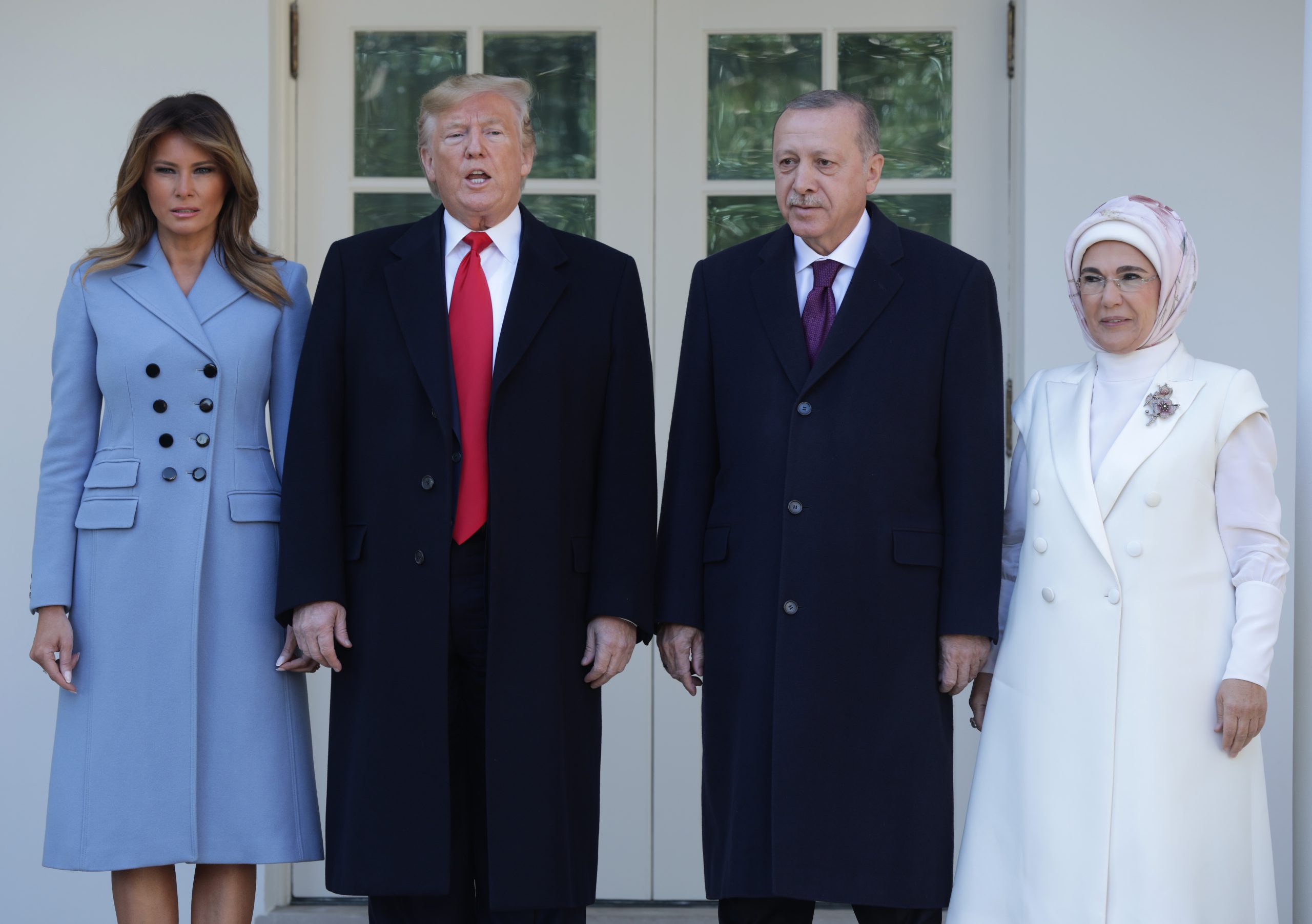 WASHINGTON, DC - NOVEMBER 13: U.S. President Donald Trump and first lady Melania Trump (L) welcome Turkish President Recep Tayyip Erdogan and his wife Emine Erdogan (R) upon their arrival at the South Portico of the White House on November 13, 2019 in Washington, DC. The two leaders will meet in the Oval Office before speaking to the media during an East Room joint news conference later in the day.  (Photo by Alex Wong/Getty Images)