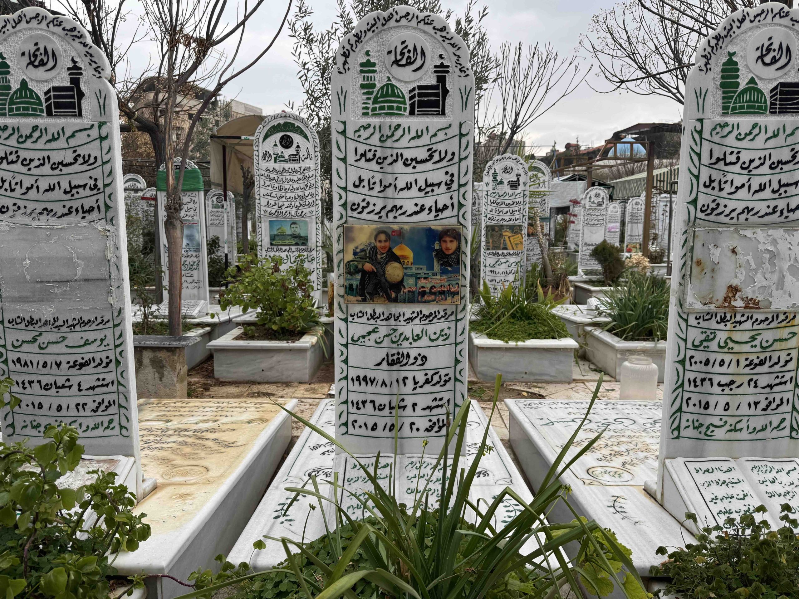 The grave of Zain Abideen Hussein Al Ajami, a Syrian fighter for Hezbollah who died in 2015, at the Shia cemetery beside the Sayida Zaynab Shrine outside Damascus. Source: Thanassis Cambanis