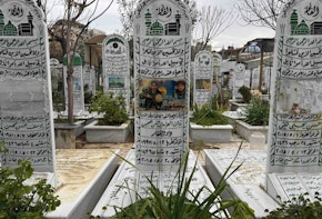 The grave of Zain Abideen Hussein Al Ajami, a Syrian fighter for Hezbollah who died in 2015, at the Shia cemetery beside the Sayida Zaynab Shrine outside Damascus. Source: Thanassis Cambanis