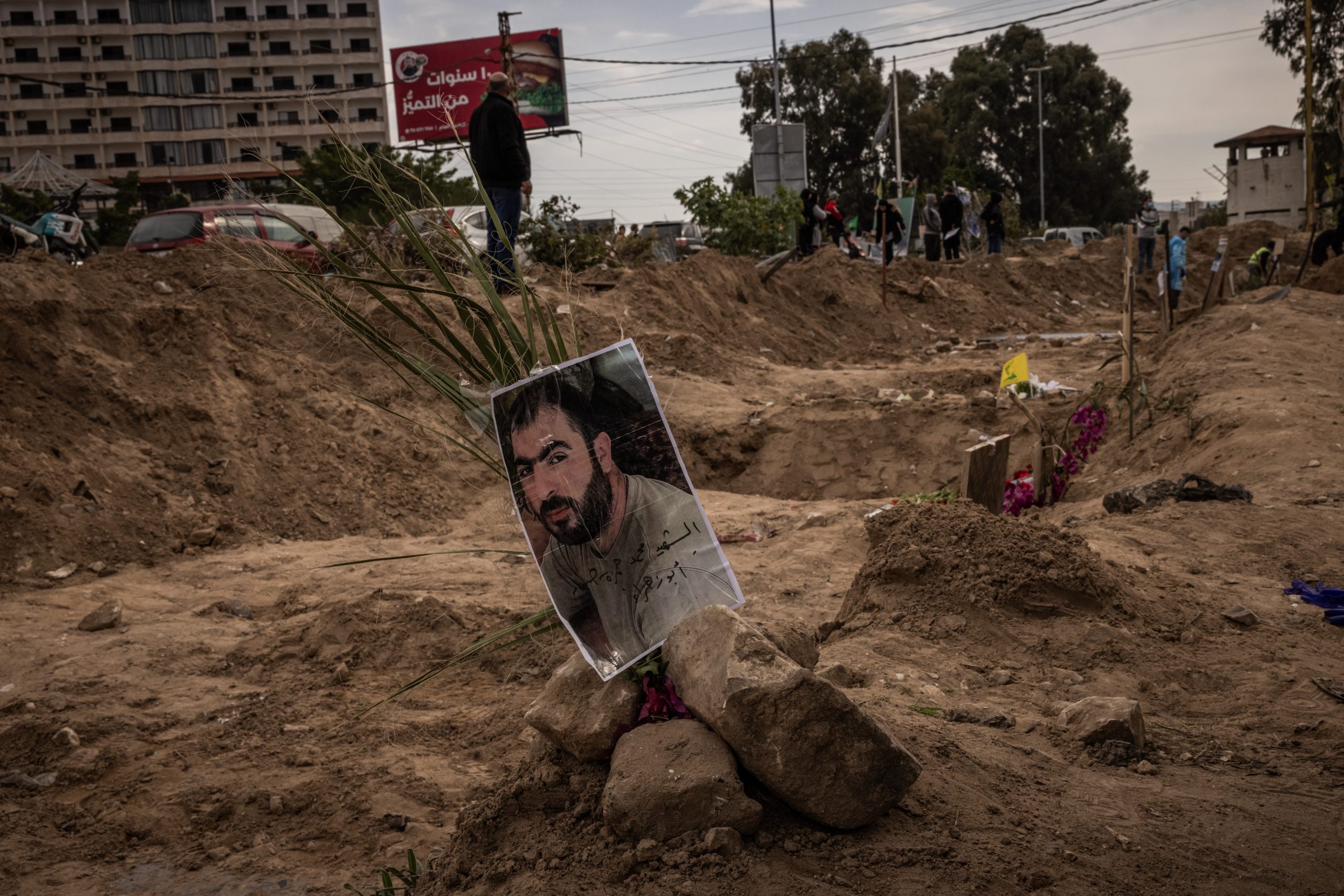 Photos of people who were killed and buried between September and November as seen as graves of civilians and fighters were exhumed for relocation on