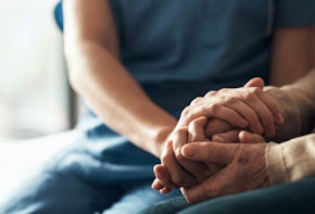 Closeup, hands and nurse with patient, empathy and compassion for grief, loss and sympathy. Zoom, mature lady and caregiver with support, trust and solidarity with bonding, healing together and care