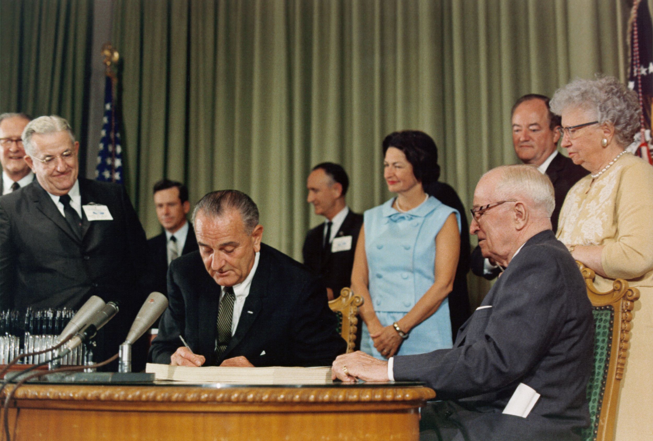 Photograph of President Lyndon B. Johnson Signing the Medicare Bill; 7/30/1965