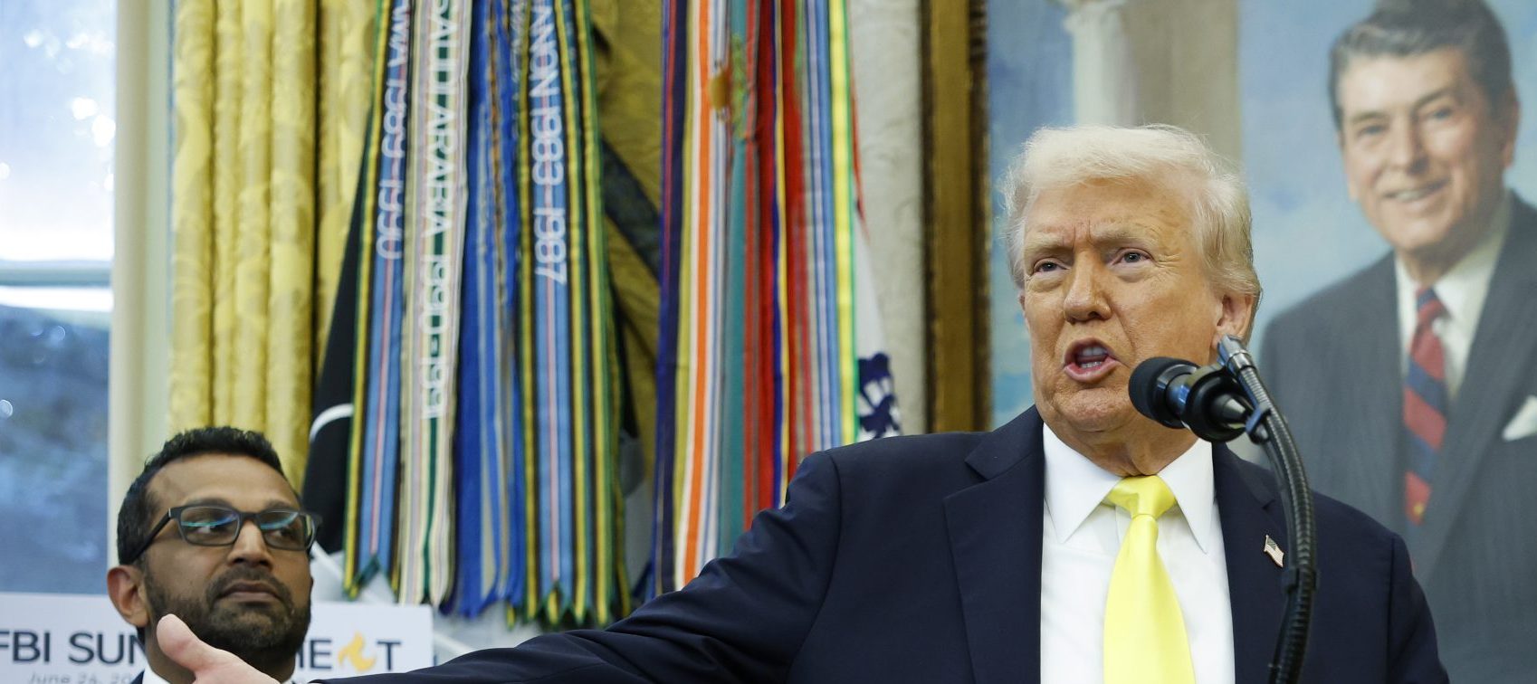 WASHINGTON, DC - OCTOBER 15: U.S. President Donald Trump speaks as Federal Bureau of Investigation Director Kash Patel (L) and U.S. Attorney General Pam Bondi look on during a press conference in the Oval Office of the White House on October 15, 2025 in Washington, DC. Trump and Patel provided an update on the Trump administration’s progress in reducing violent crime. (Photo by Kevin Dietsch/Getty Images)