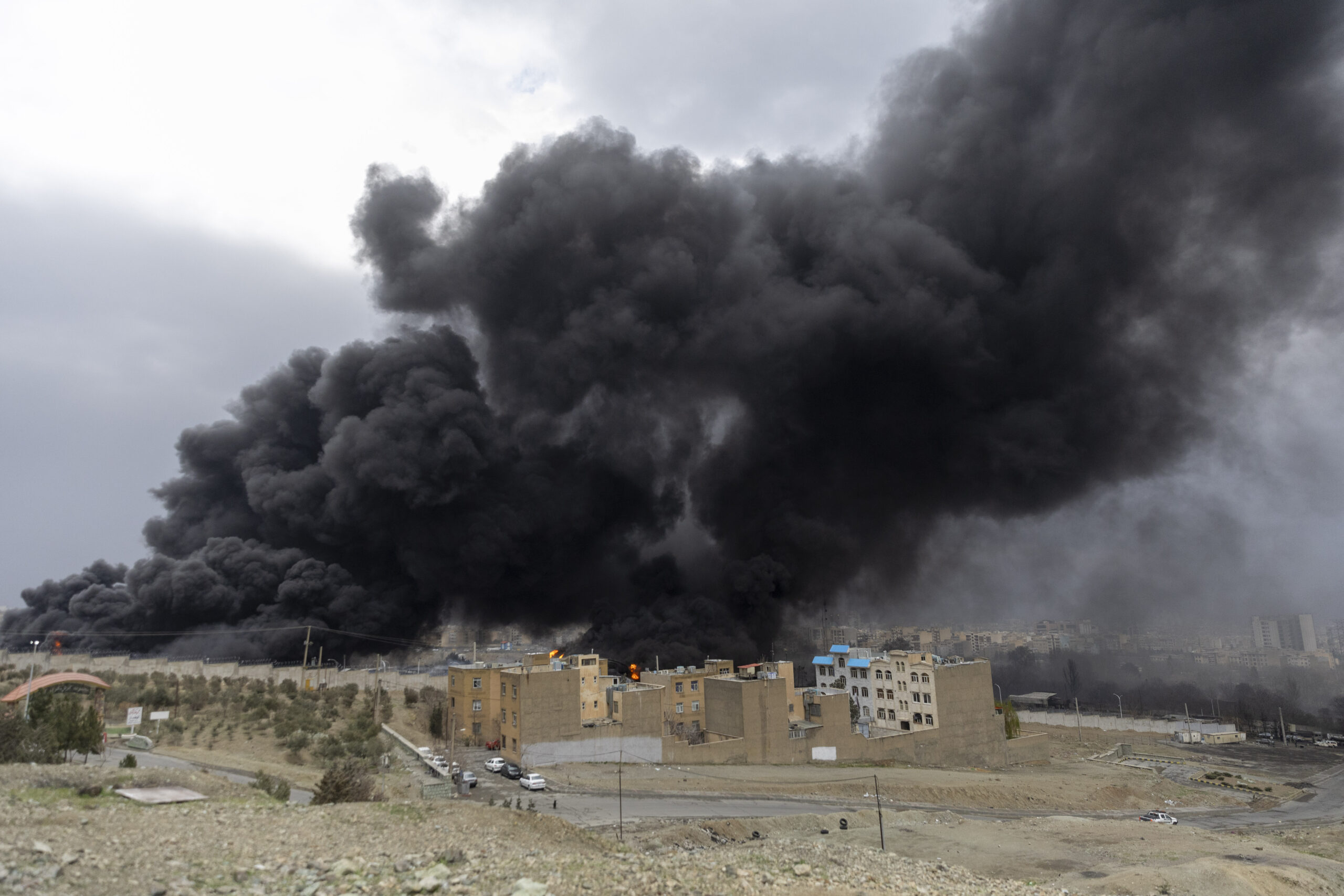 TEHRAN, IRAN - MARCH 8: Smoke billows after overnight airstrikes on oil depots on March 8, 2026 in Tehran, Iran. The United States and Israel continued their joint attack on Iran that began on February 28. Iran retaliated by firing waves of missiles and drones at Israel, and targeting U.S. allies in the region. (Photo by Majid Saeedi/Getty Images)
